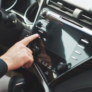 man-includes-an-audio-system-in-the-car.jpg